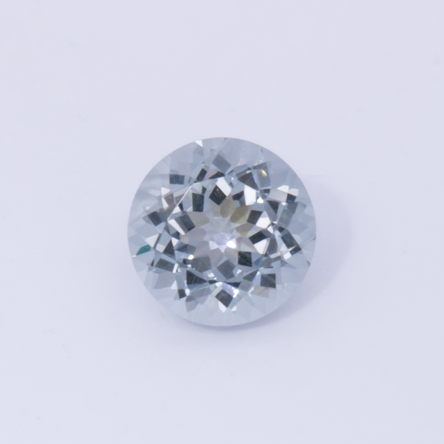 Spinell - grau, rund, 4.6x4.6 mm, 0.45 cts, Nr. SP90083
