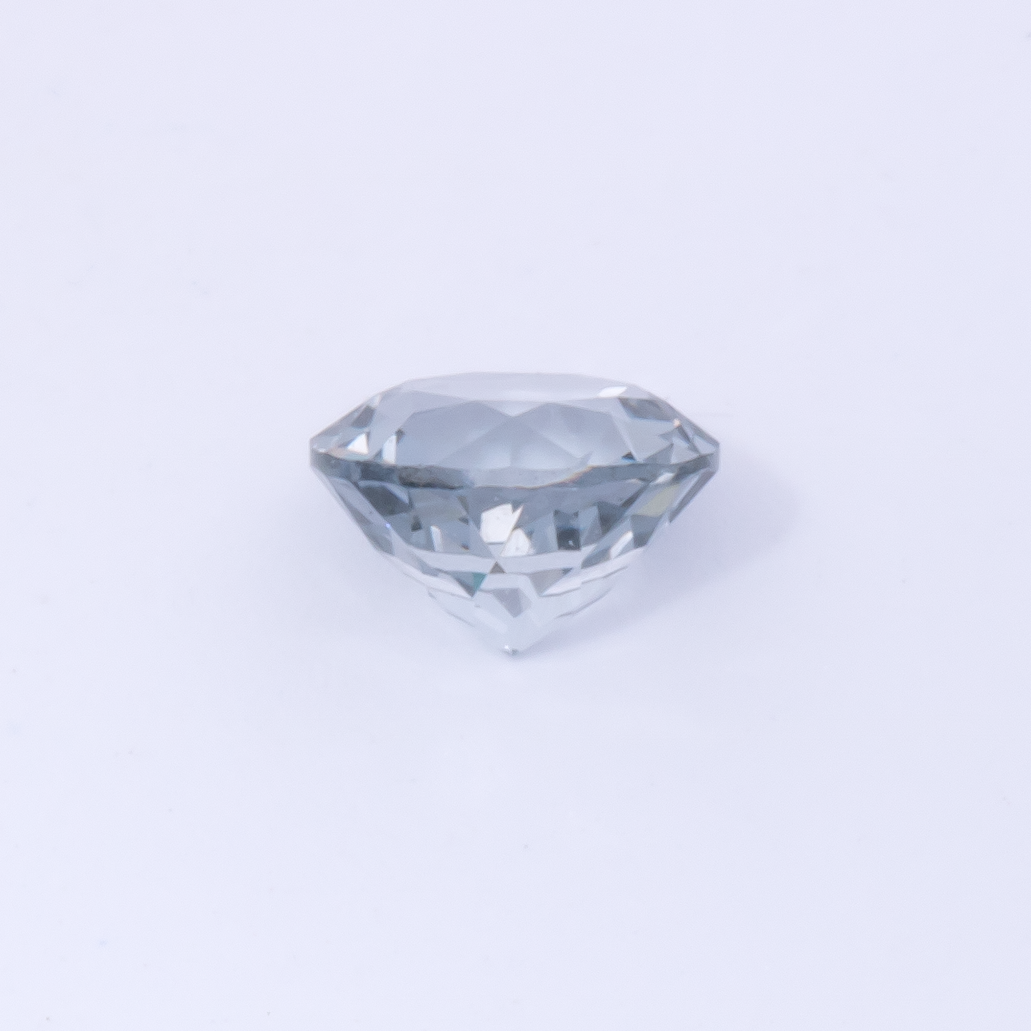 Spinell - grau, rund, 4.6x4.6 mm, 0.45 cts, Nr. SP90083