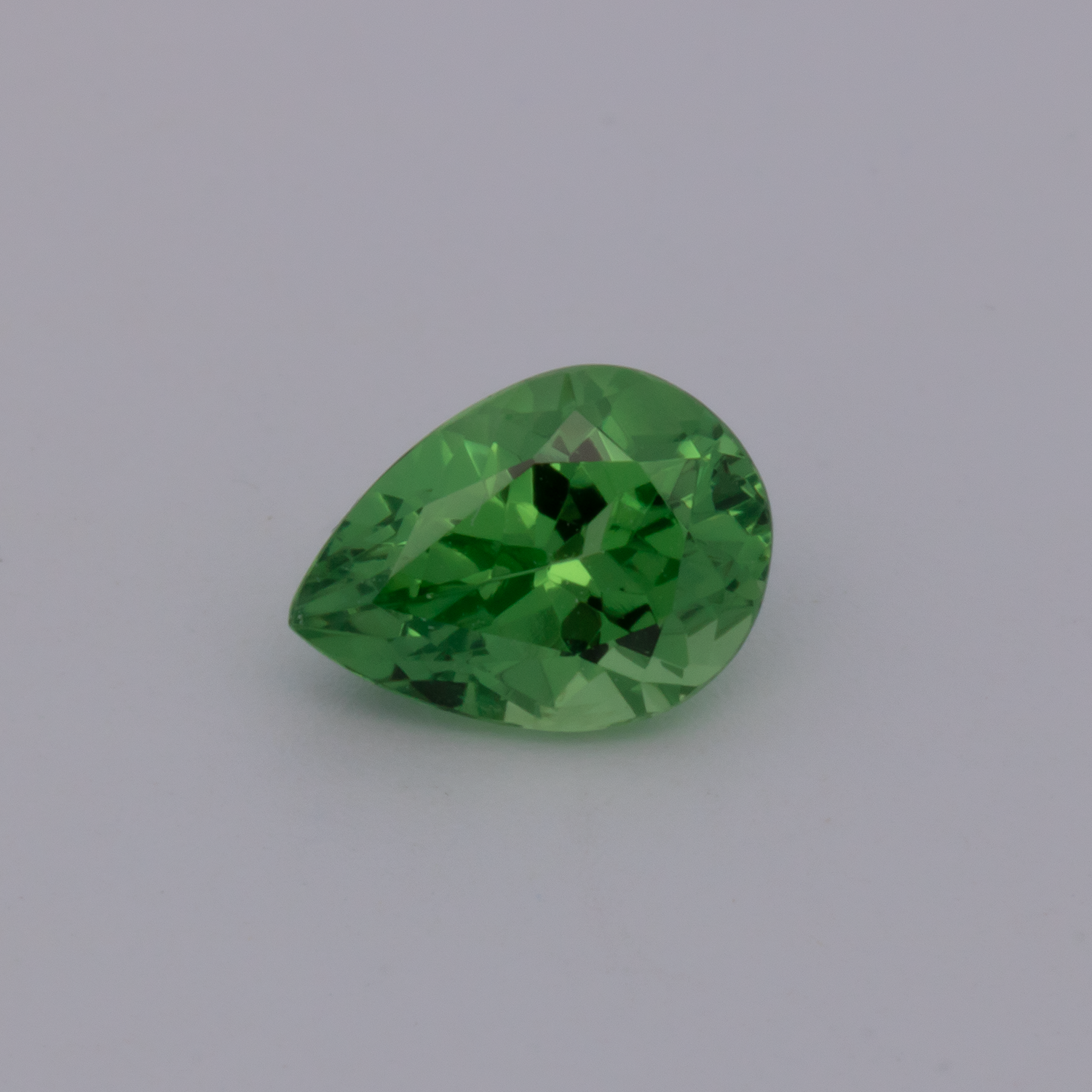 Tsavorit - grün, birnform, 6.8x5 mm, 0.79 cts, Nr. TS91023