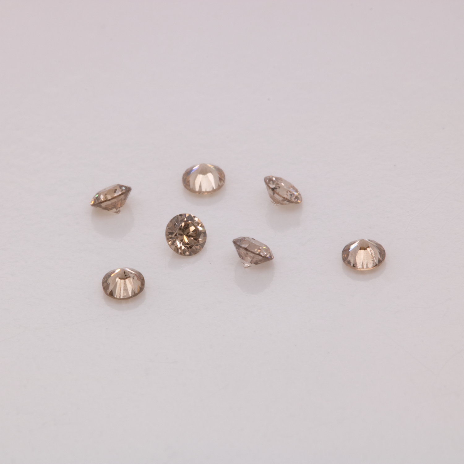 Diamant - braun, VS-SI, rund, 1,3mm, ca. 0,01 cts, Nr. D11044