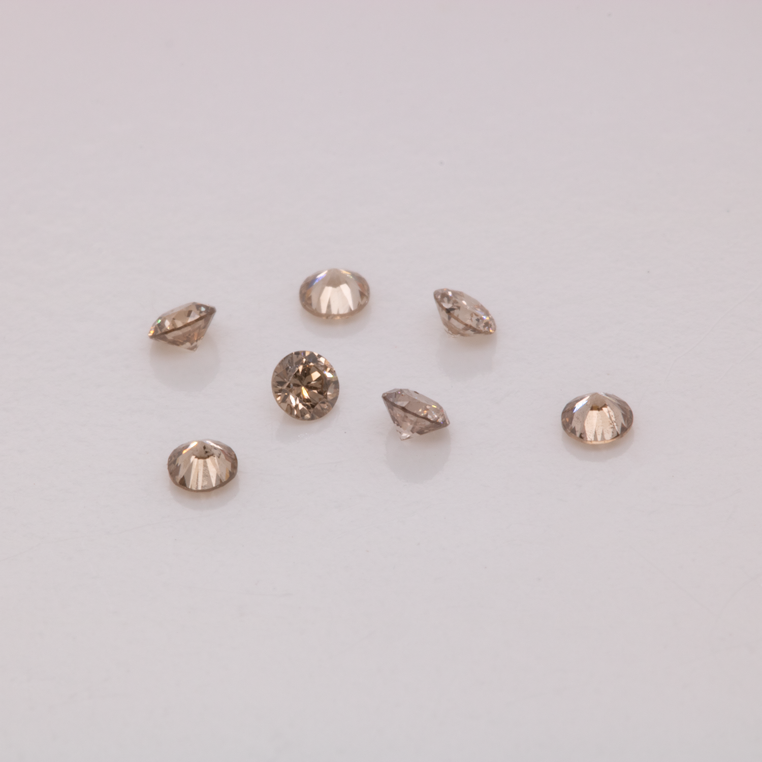 Diamond - brown, VS-SI, round, 1.3mm, approx. 0.01 cts, No. D11044