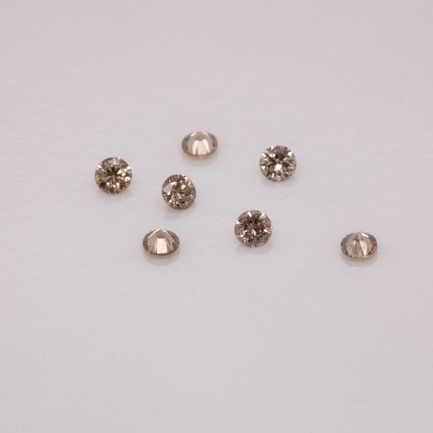 Diamant - braun, VS-SI, rund, 1,3mm, ca. 0,01 cts, Nr. D11044