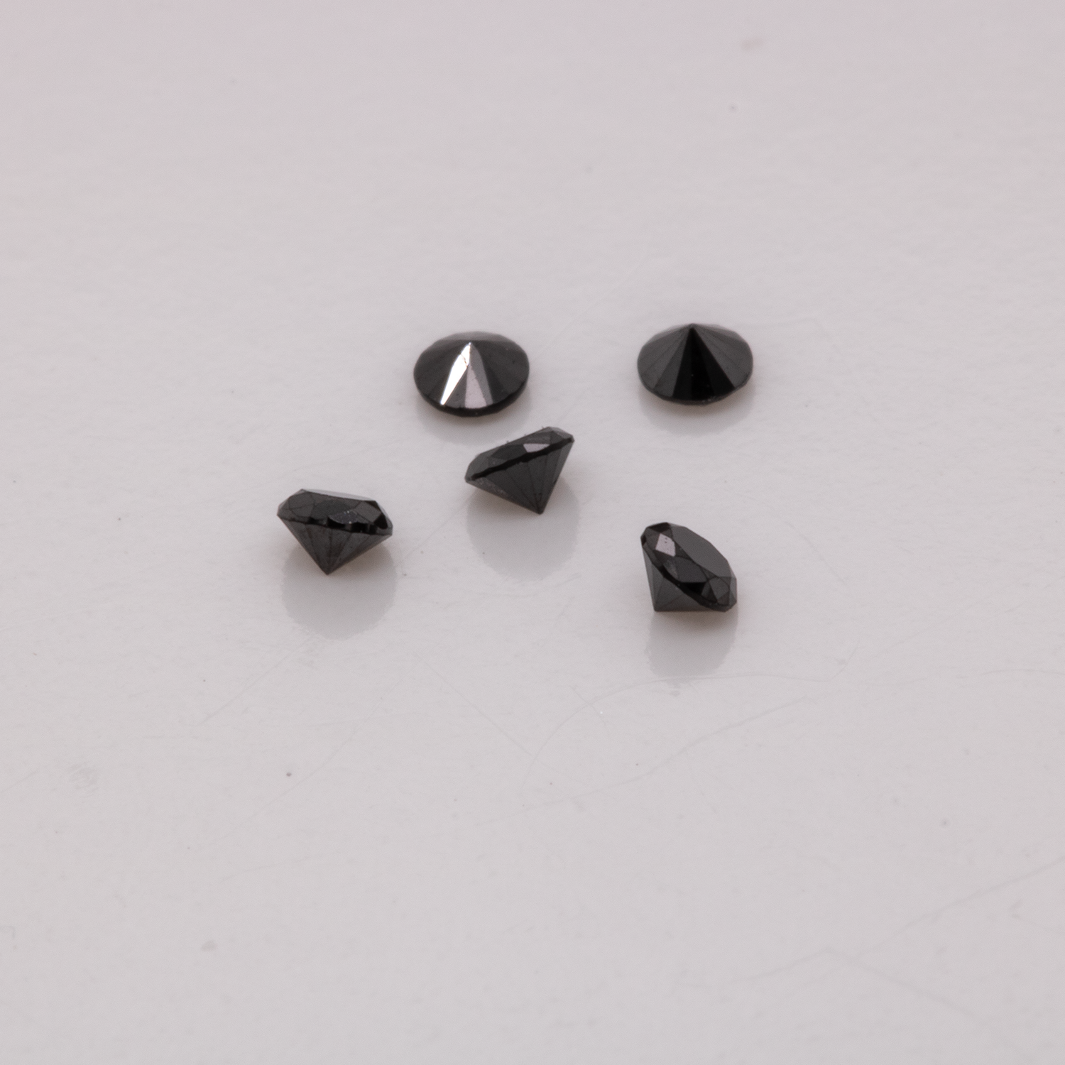 Diamond - black, non-transparent, round, 1.5 mm, approx. 0.015 cts, No. D11058