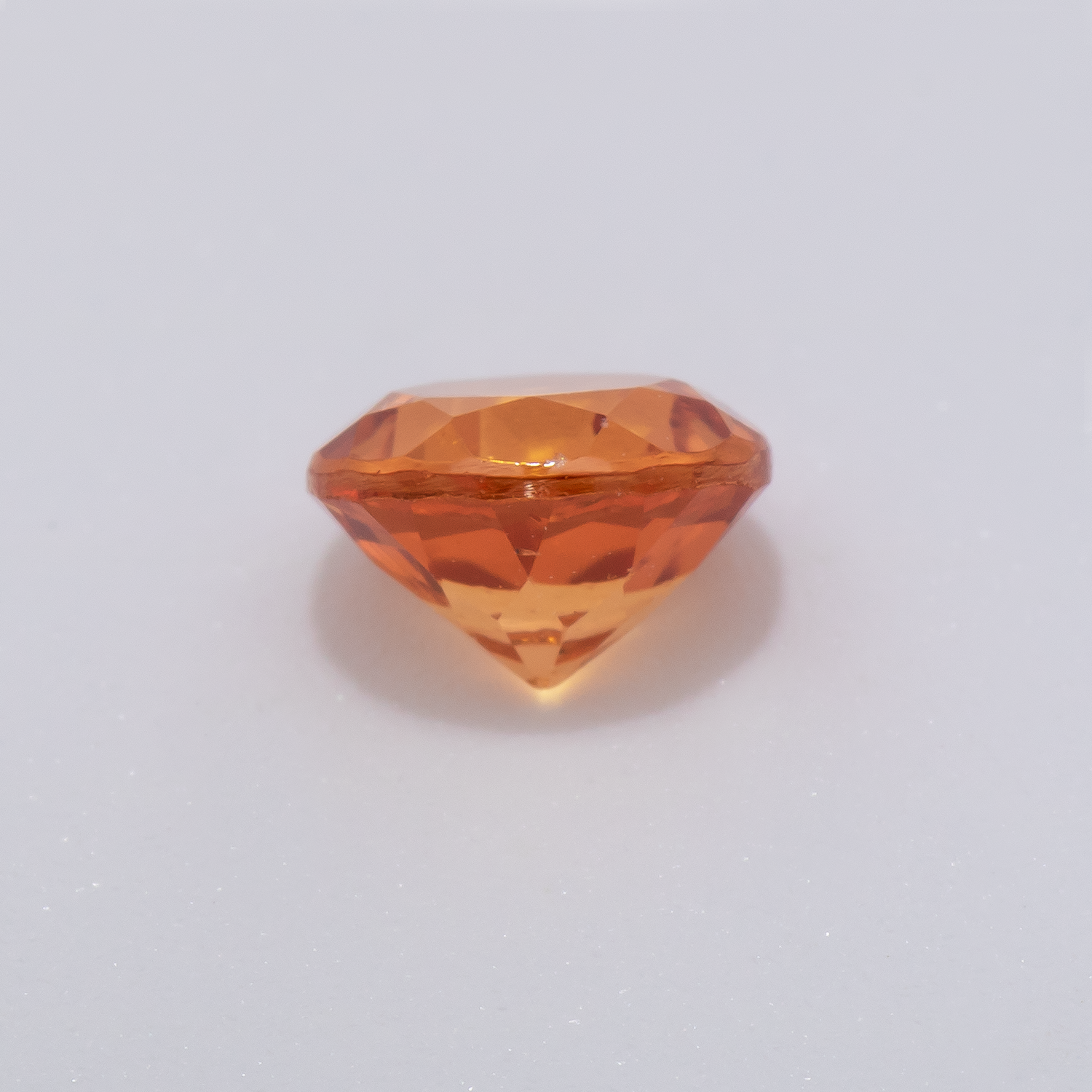 Mandarin Garnet - orange, round, 5x5 mm, 0.66 - 0.71 cts, No. MG99060
