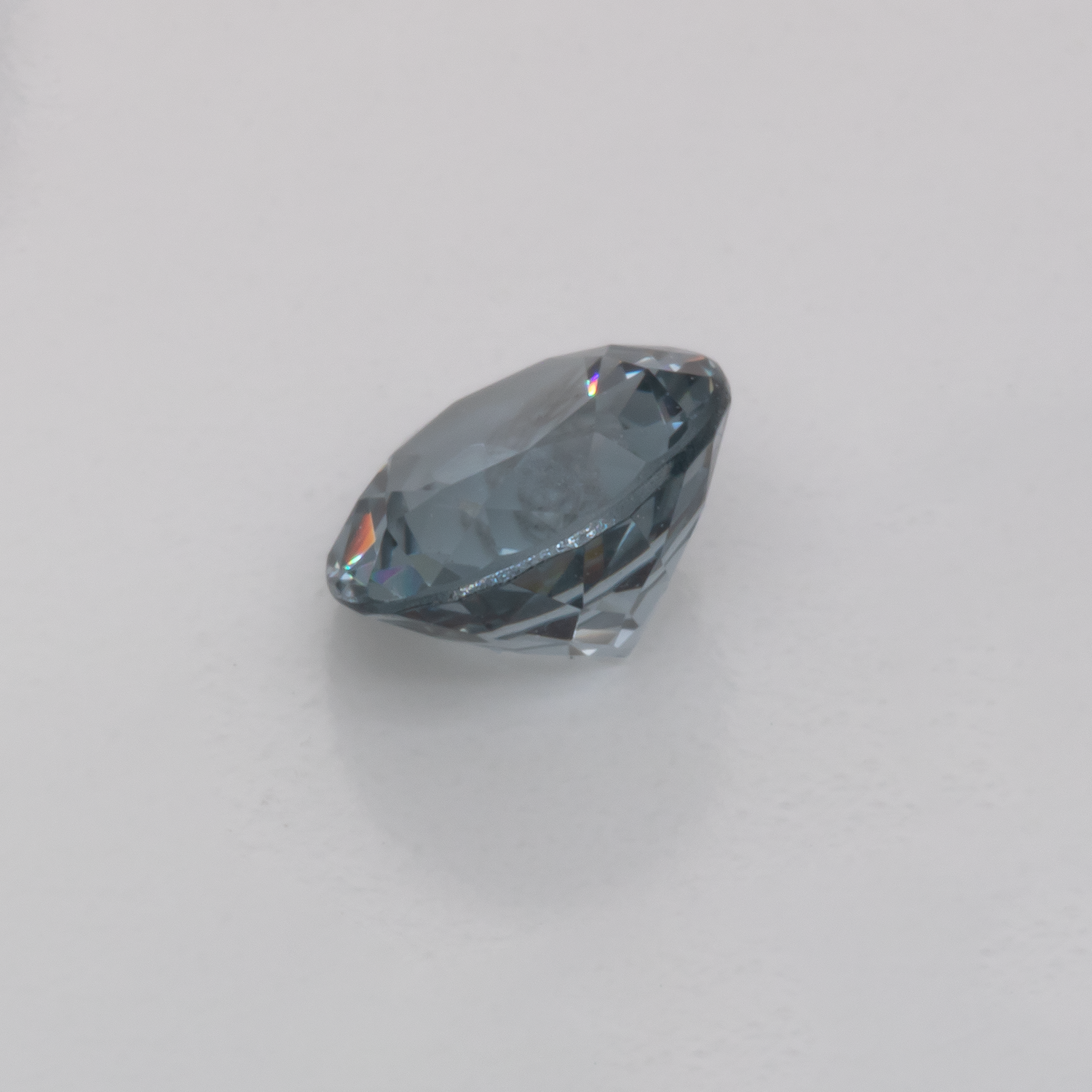 Spinel - blue/grey, round, 5.1x5.1 mm, 0.57 cts, No. SP90012