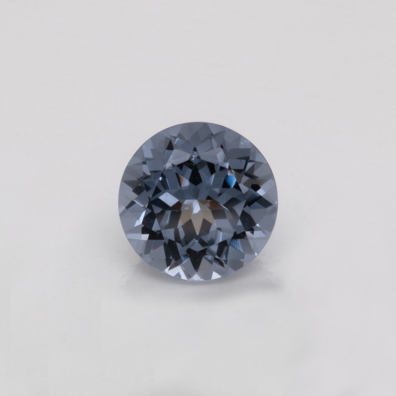 Spinel - purple/grey, round, 5.1x5.1 mm, 0.56 cts, No. SP90013