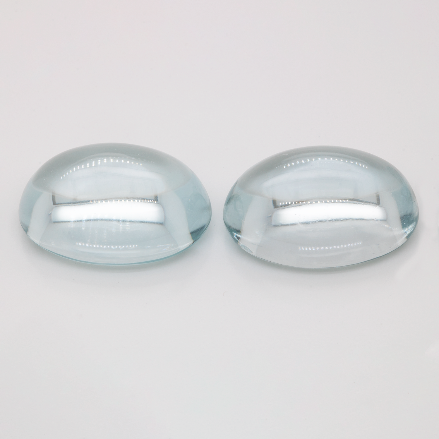 Topaz Set - light blue, oval & pearshape, 19.9x15 mm, 94.74 cts, No. TPZ60001