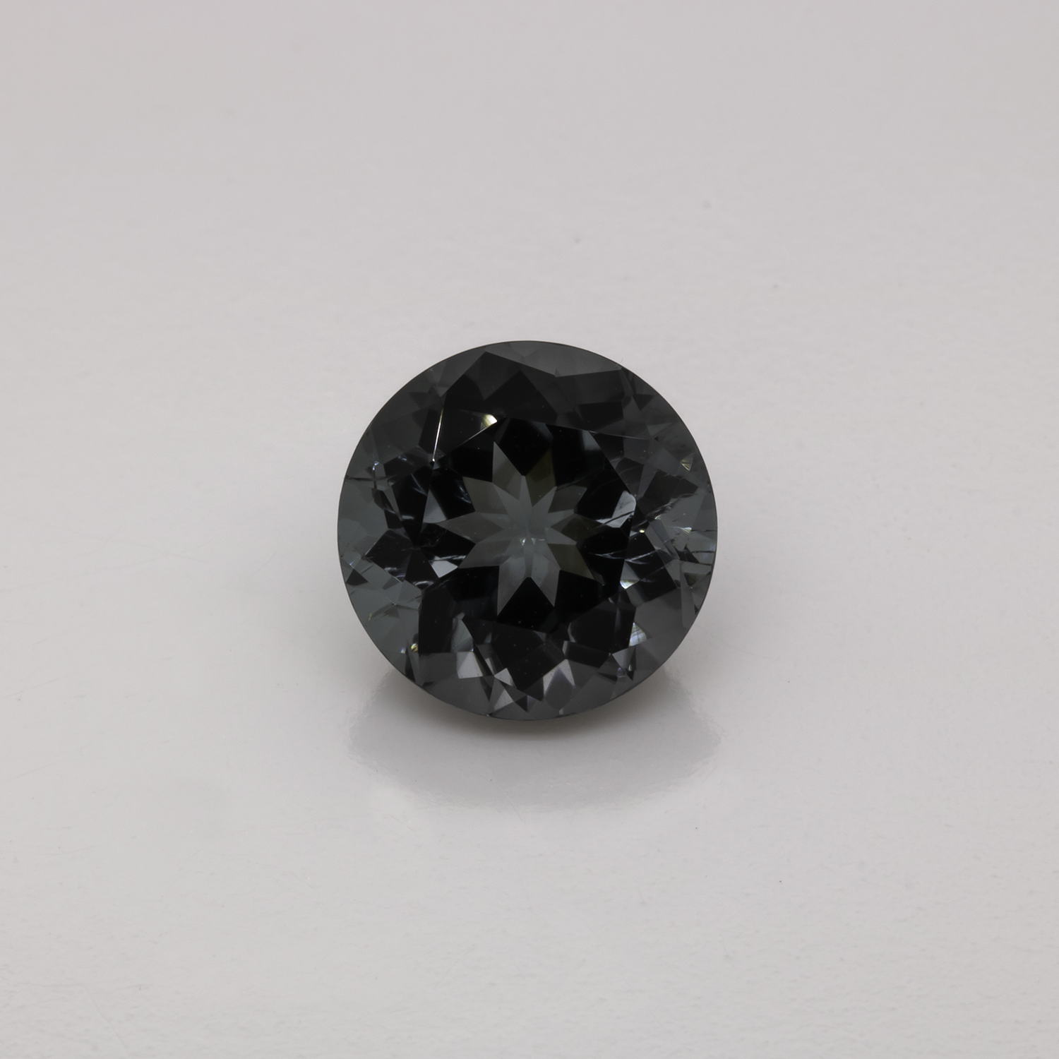 Turmalin -  grau, rund, 9,1x9,1 mm, 3,03 cts, Nr. TR991039