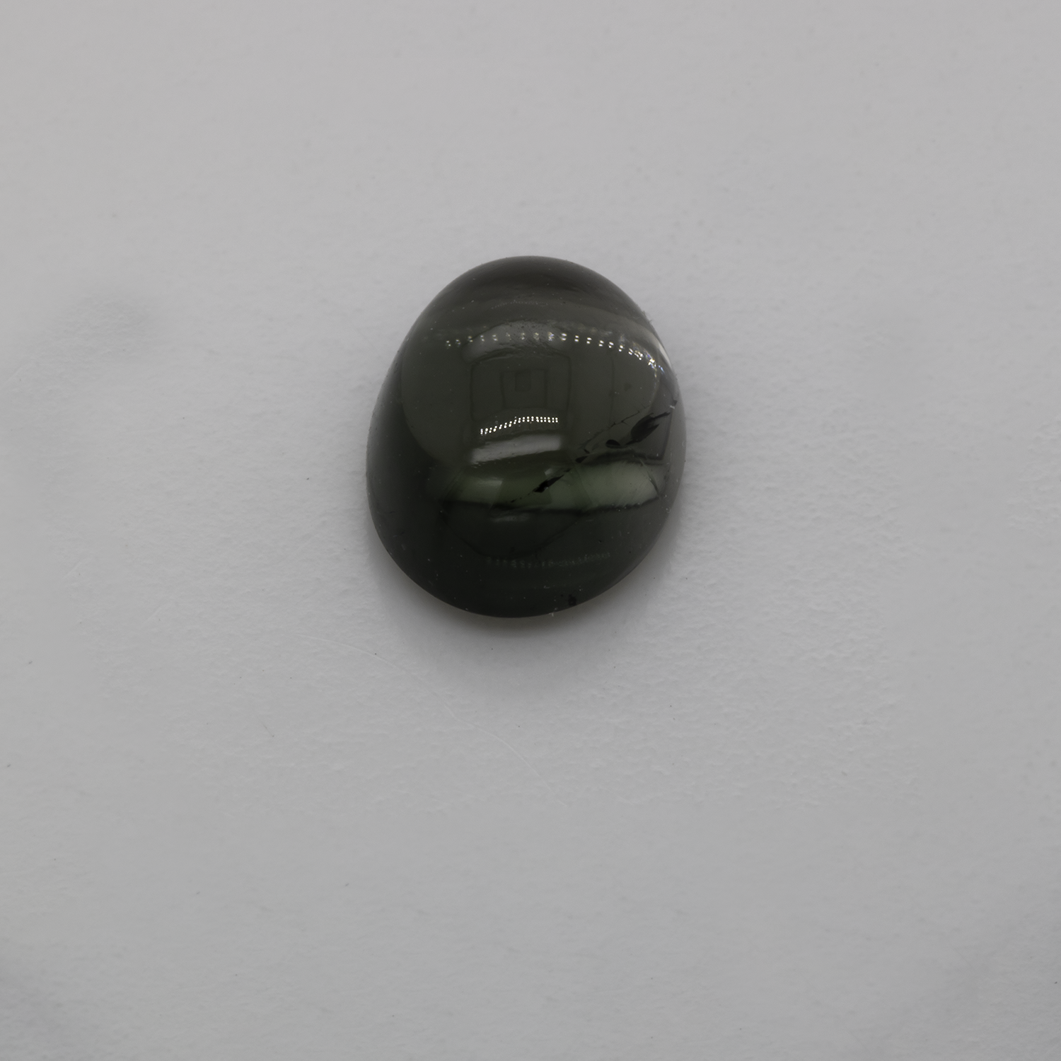 Turmalin - grau, oval, 8,2x6,3 mm, 1,86 cts, Nr. TR99104