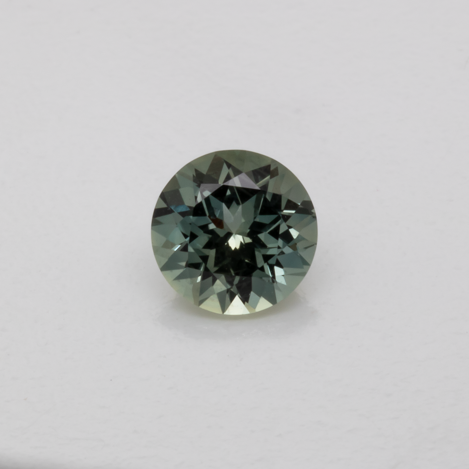 Sapphire - blue/green, round, 4.7x4.7 mm, 0.42 cts, No. XSR11183
