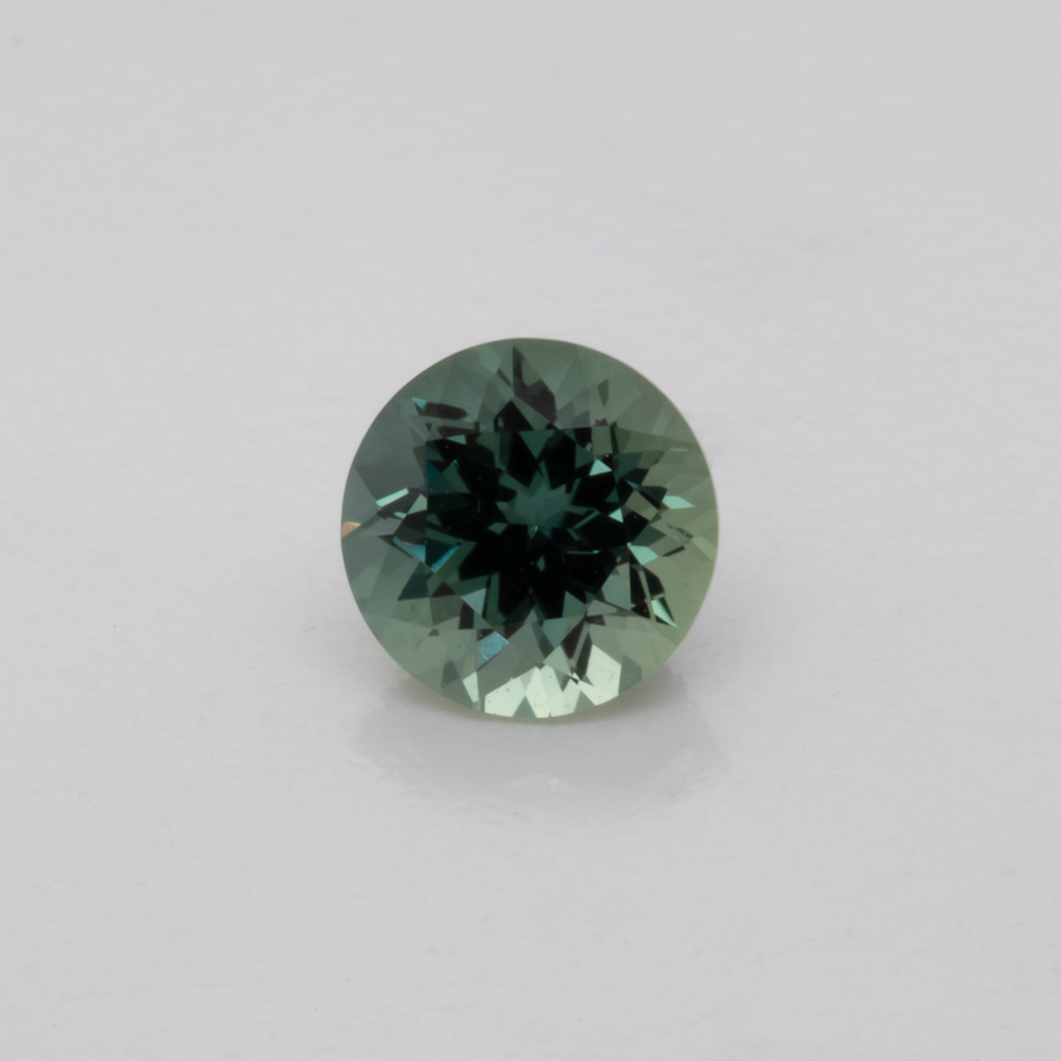 Saphir - blau/grün, rund, 4,8x4,8 mm, 0,53 cts, Nr. XSR11186