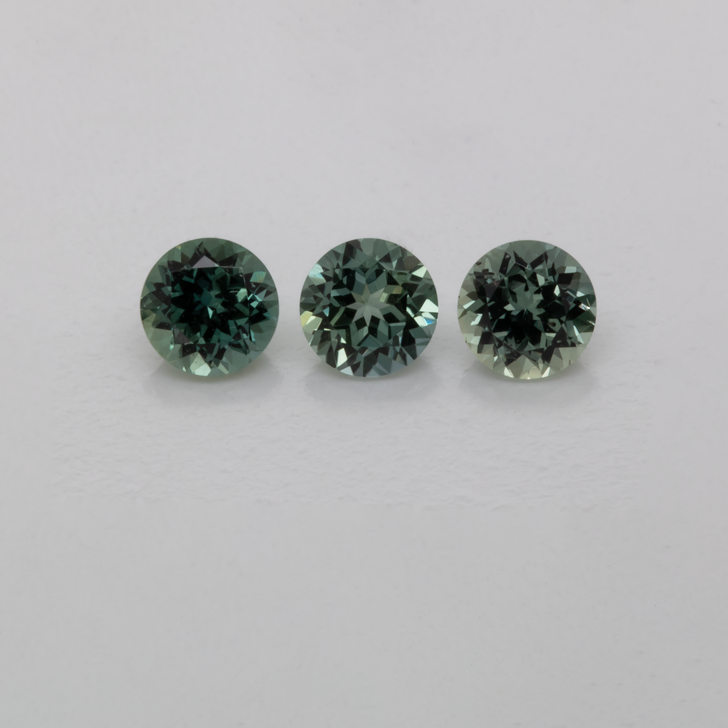 Sapphire Set - blue/green, round, 3.5x3.5 mm, 0.67 cts, No. XSR11189