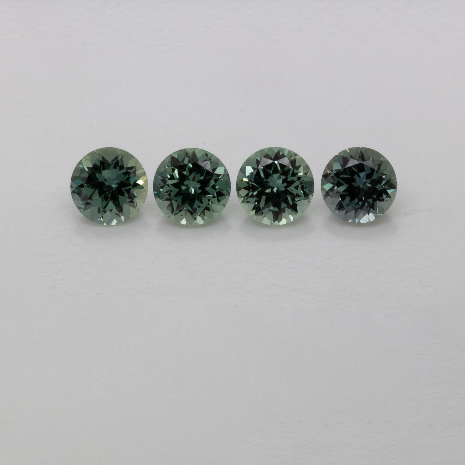 Sapphire Set - blue/green, round, 3.6x3.6 mm, 0.87 cts, No. XSR11190