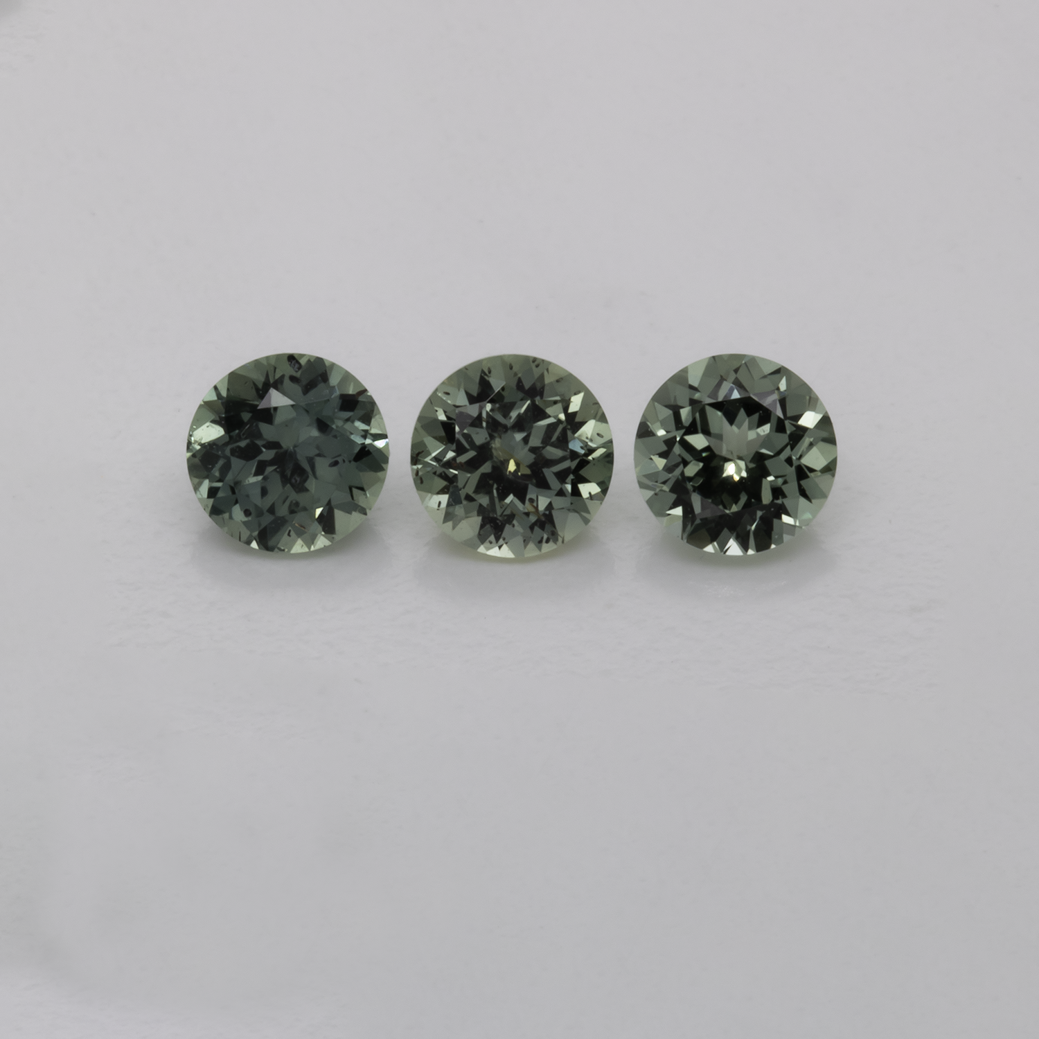 Saphir Set - blau/grün/grau, rund, 4x4 mm, 0,98 cts, Nr. XSR11198