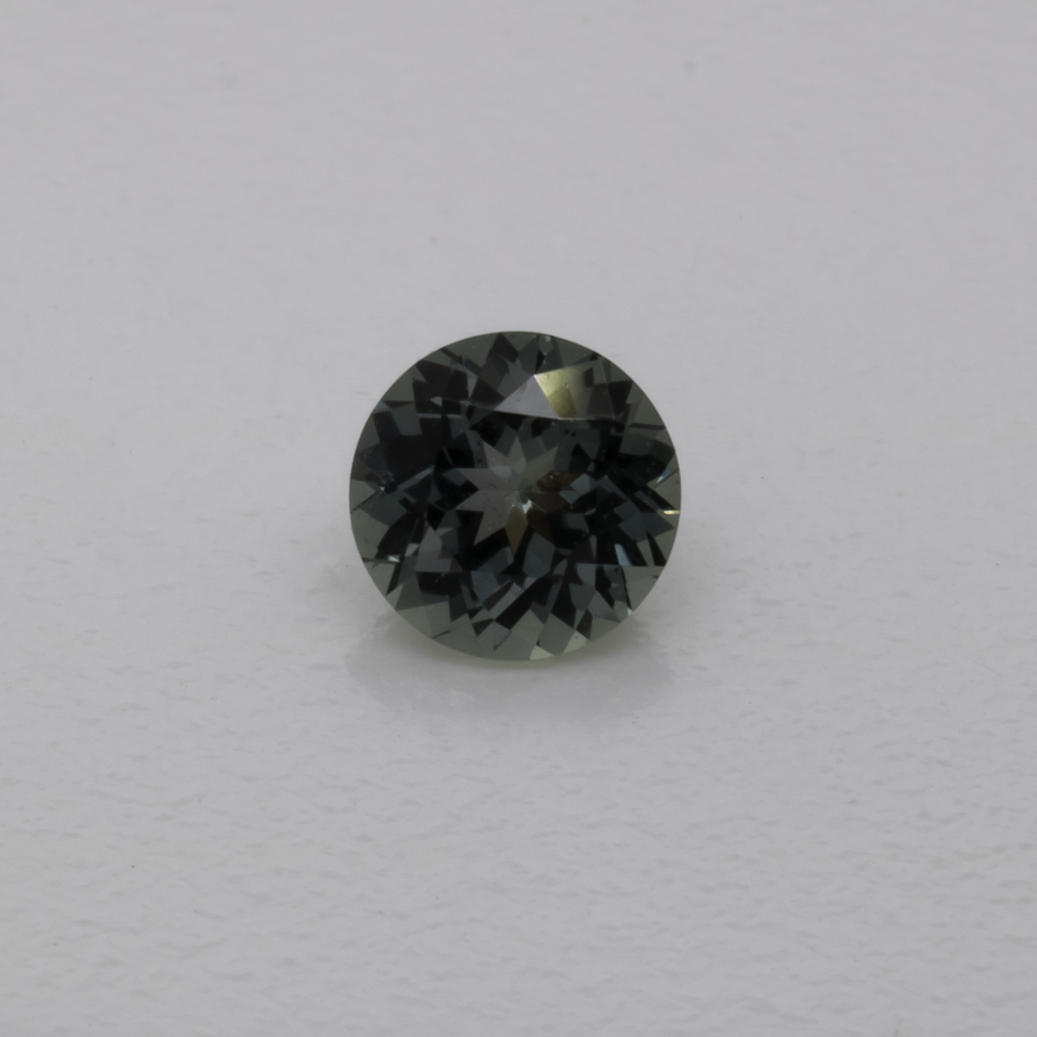 Sapphire - blue/green, round, 4x4 mm, 0.30 cts, No. XSR11206
