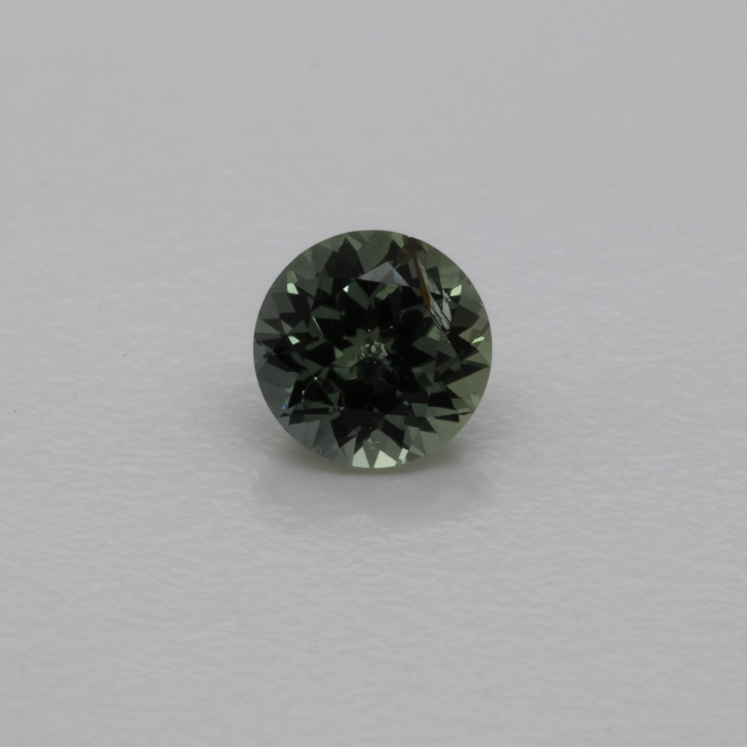 Sapphire - blue/green, round, 4.1x4.1 mm, 0.33 cts, No. XSR11209