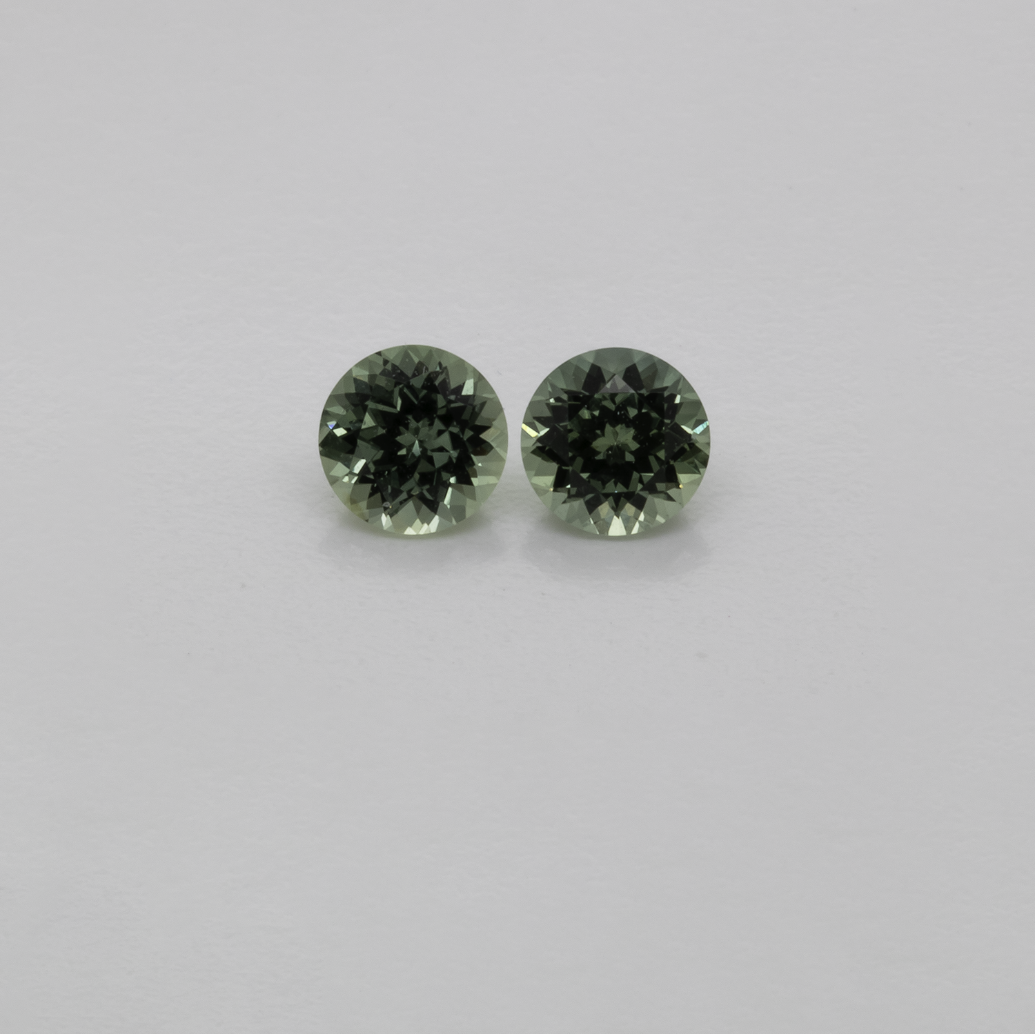 Sapphire Pair - blau/green, round, 4.1x4.1 mm, 0.65 cts, No. XSR11213