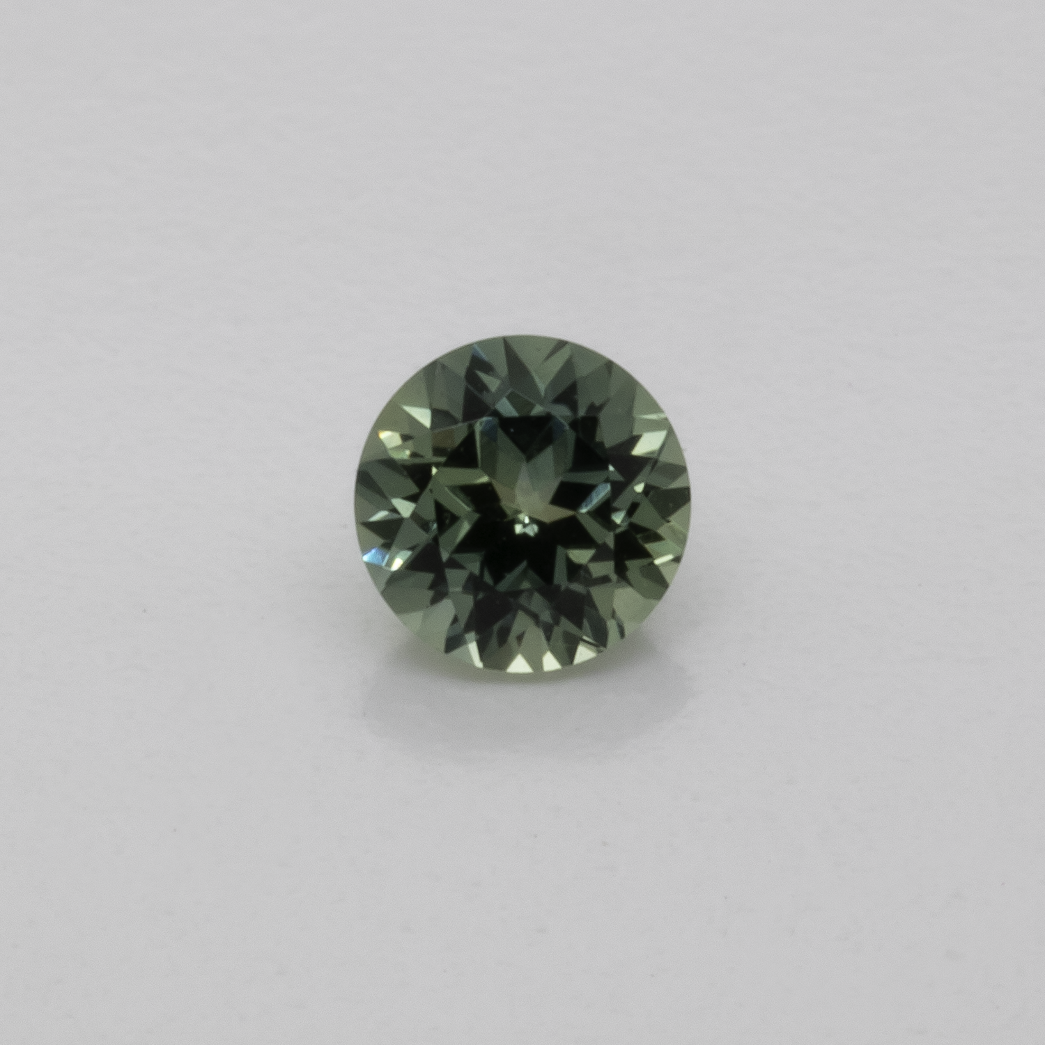Sapphire - blue/green, round, 4.1x4.1 mm, 0.35 cts, No. XSR11214