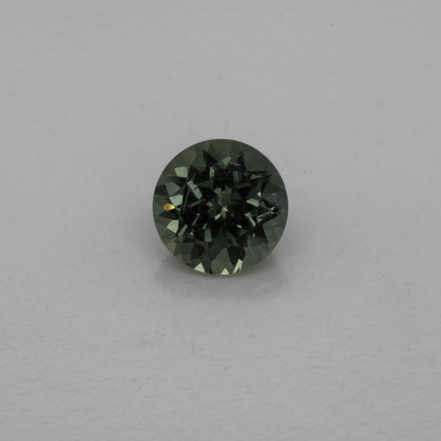 Saphir - blau/grün, rund, 4x4 mm, 0,32 cts, Nr. XSR11224