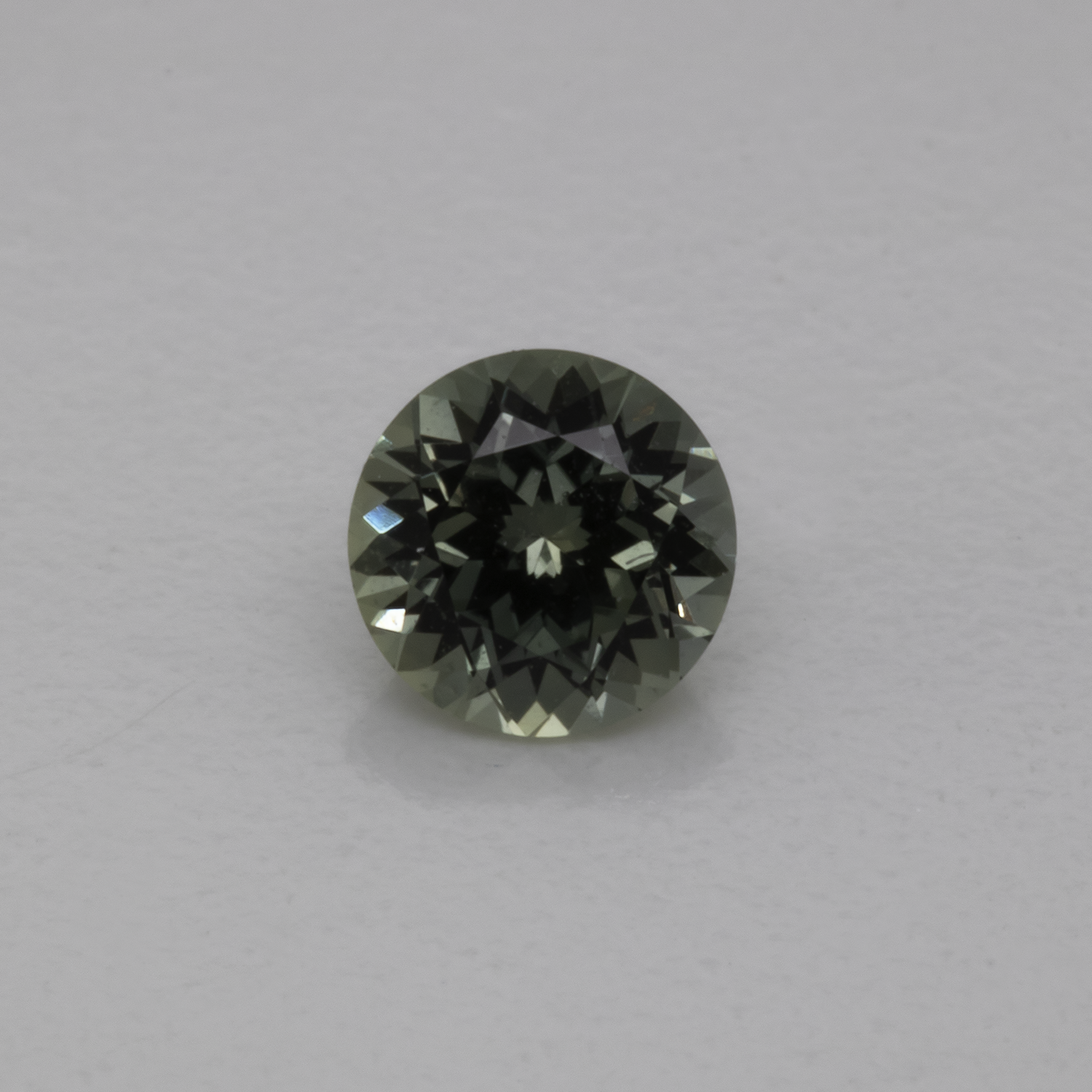 Saphir - grün/grau, rund, 4x4 mm, 0,32 cts, Nr. XSR11228