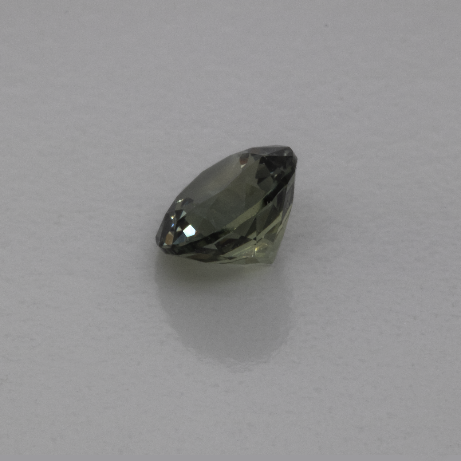 Sapphire - green/grey, round, 4x4 mm, 0.32 cts, No. XSR11228