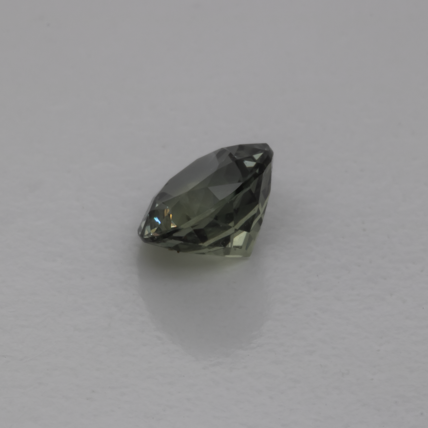 Sapphire - green/grey, round, 4x4 mm, 0.32 cts, No. XSR11229